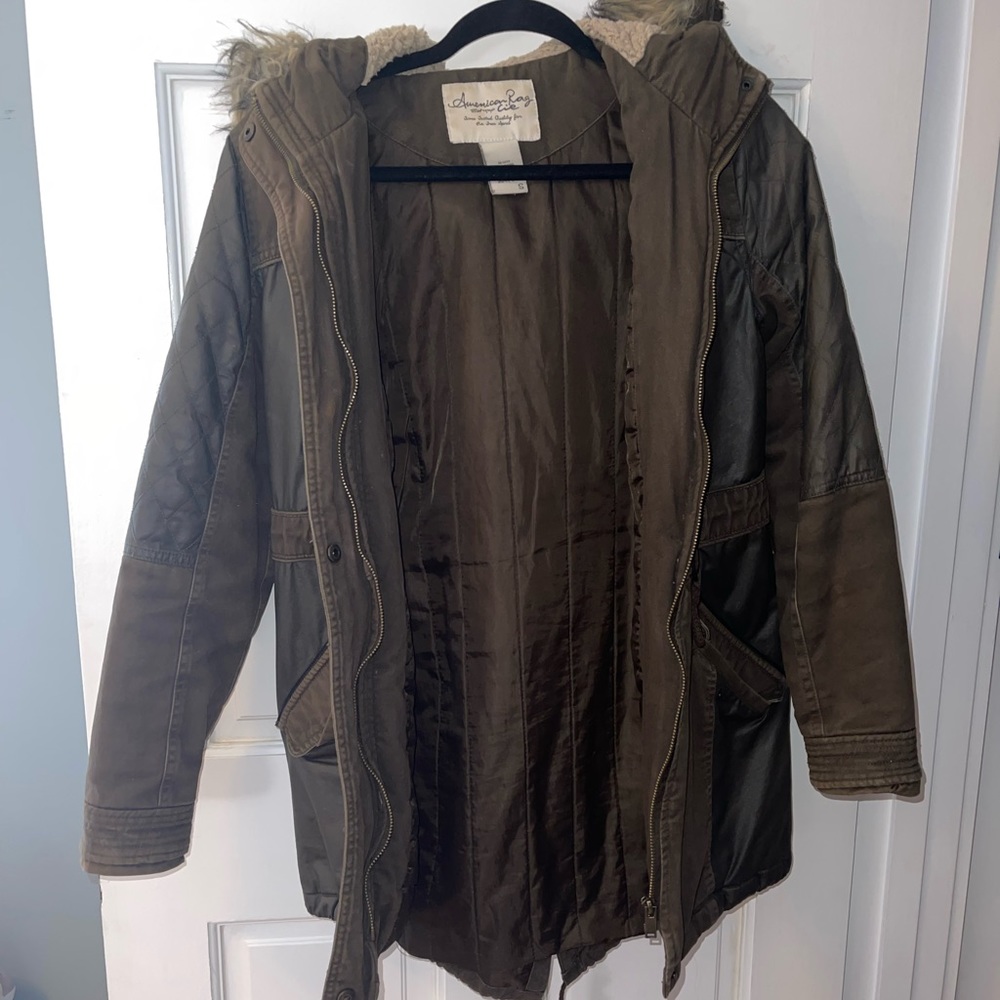 Olive green winter jacket with faux fur hood
